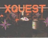 XQuest — the XQUEST title screen with treasure/loot on a table