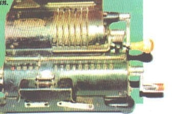 Photo of a vintage mechanical calculator, illustrating the scoring-system panel