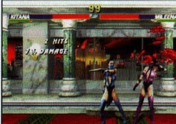 In-game screenshot: Kitana vs Milena fight in the Trilogy engine