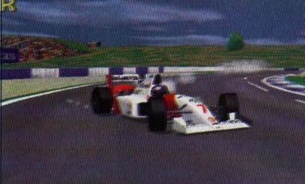 In-game screenshot: McLaren cornering with real-time smoke and shadow
