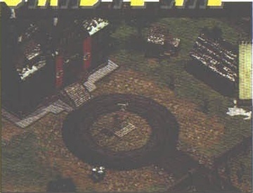 Screenshot fără legendă: bază germană văzută izometric, cu un turn de apă circular