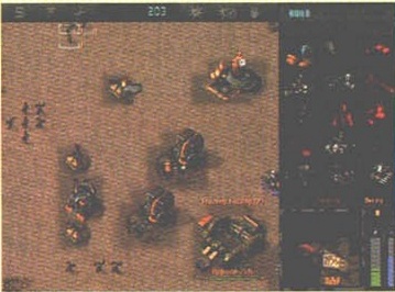 Screenshot fără legendă: teren deșertic cu unități Imperium grupate lângă o Vehicle Factory