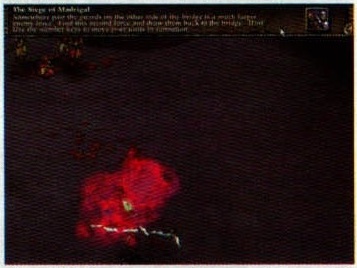 Screenshot fără legendă tipărită, marginea din dreapta: explozie roșie pe un teren întunecat; în capul imaginii, textul de misiune al jocului, „The Siege of Madrigal”