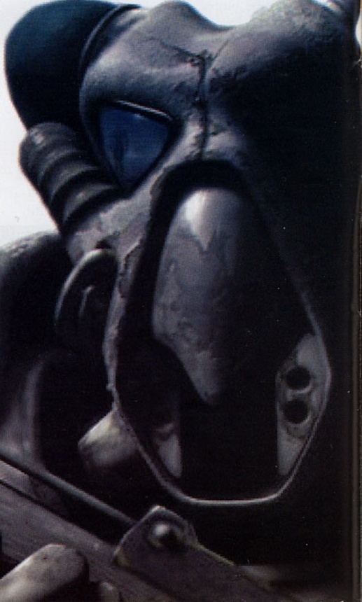 Ilustrația din josul paginii — casca de power armor. Imaginea nu are chenar și se prelungește spre stânga pe sub coloanele de text; decupajul reține doar porțiunea peste care nu cade text.