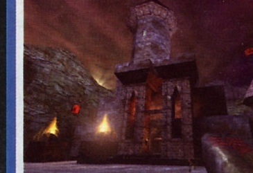 Screenshot Unreal (categoria Graphics): turn de piatră luminat de torțe într-un peisaj stâncos